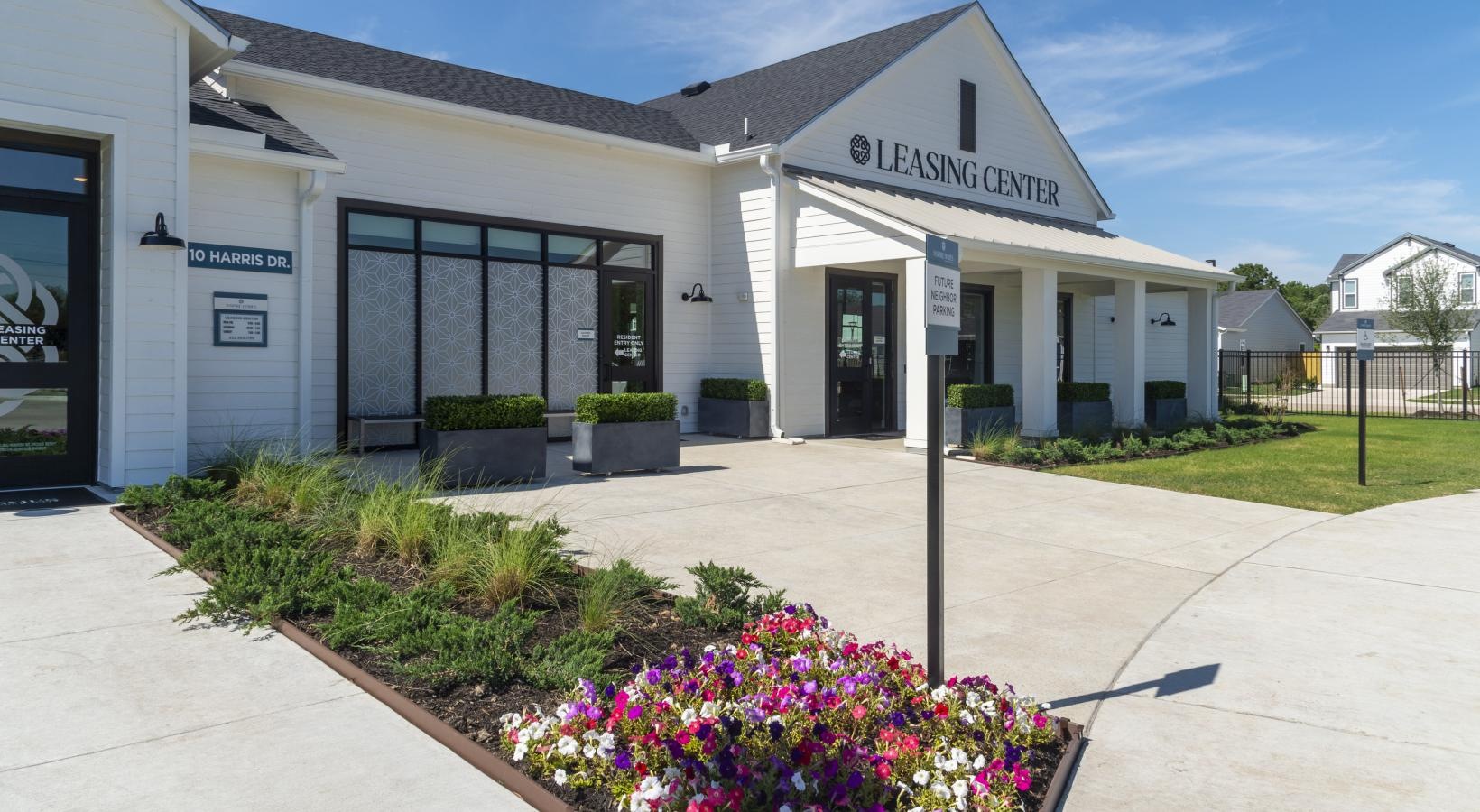 Find your perfect fit at Inspire Missouri City a building with a sign in front