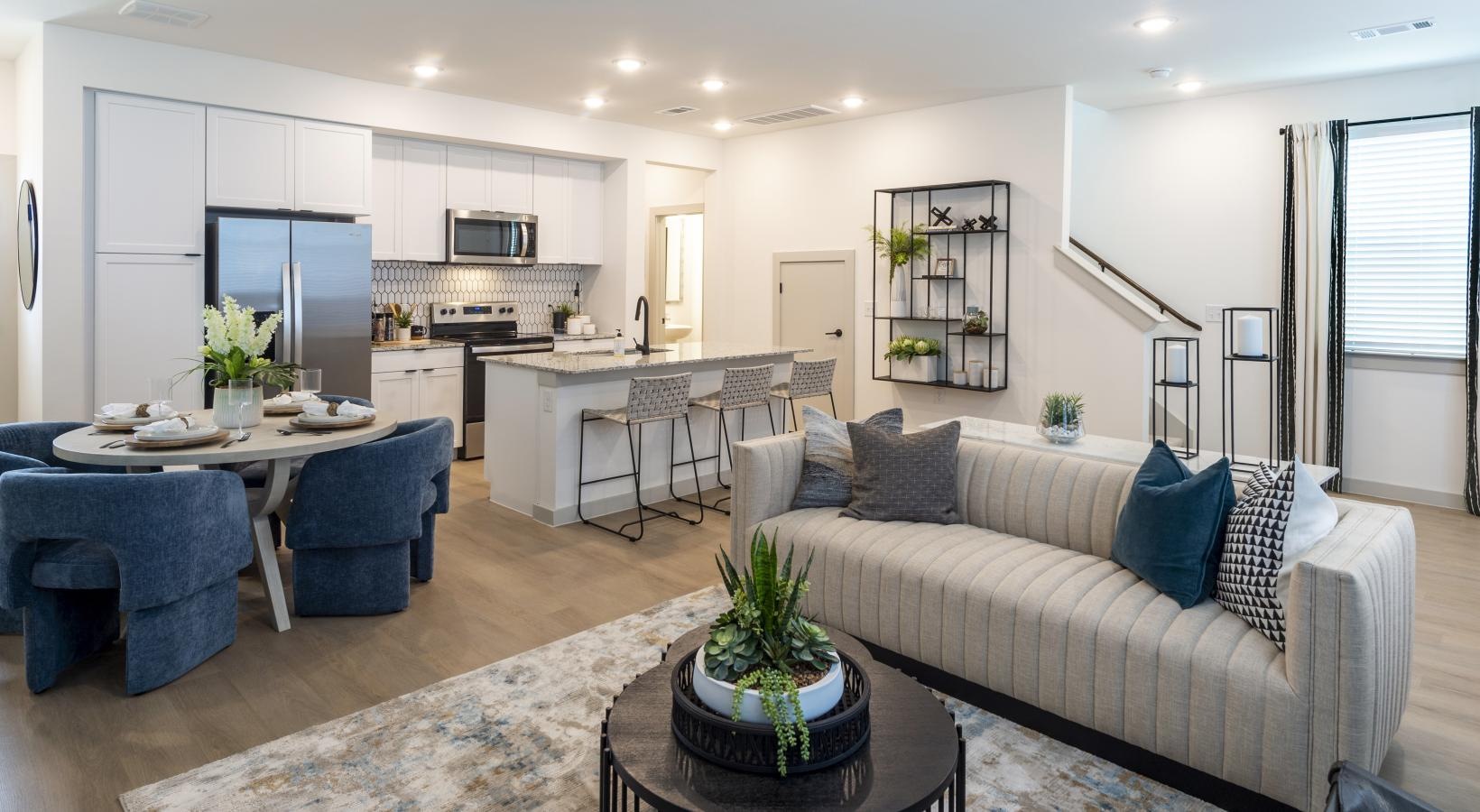 Beautiful living areas to match your lifestyle a living room with a couch and a table