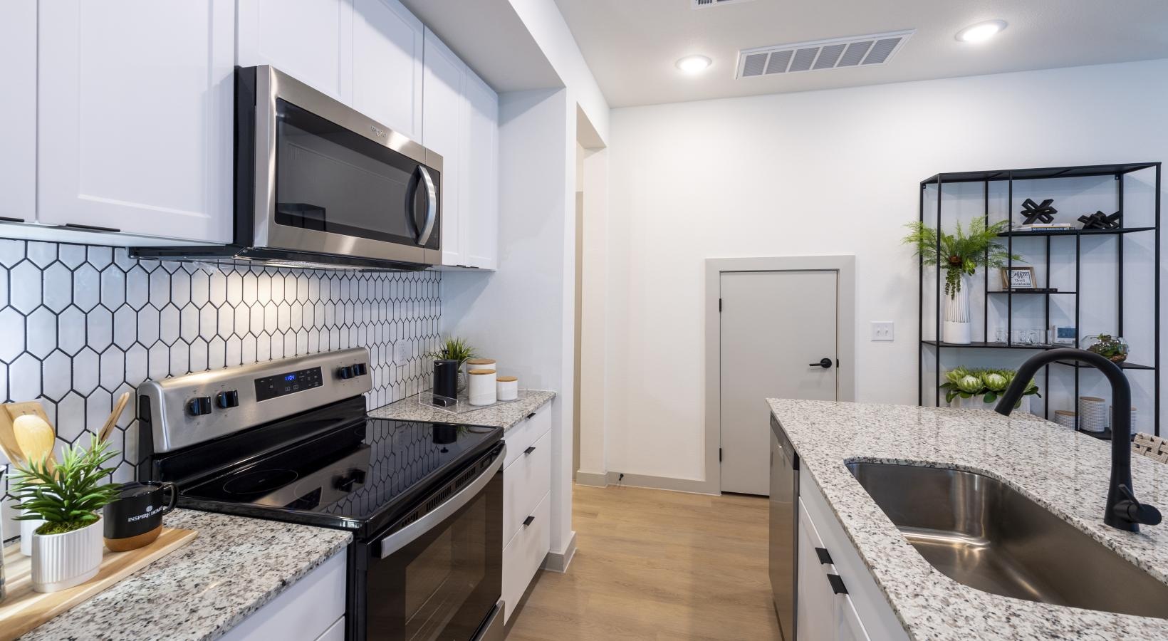 Beautiful kitchens with designer finishes a kitchen with white cabinets