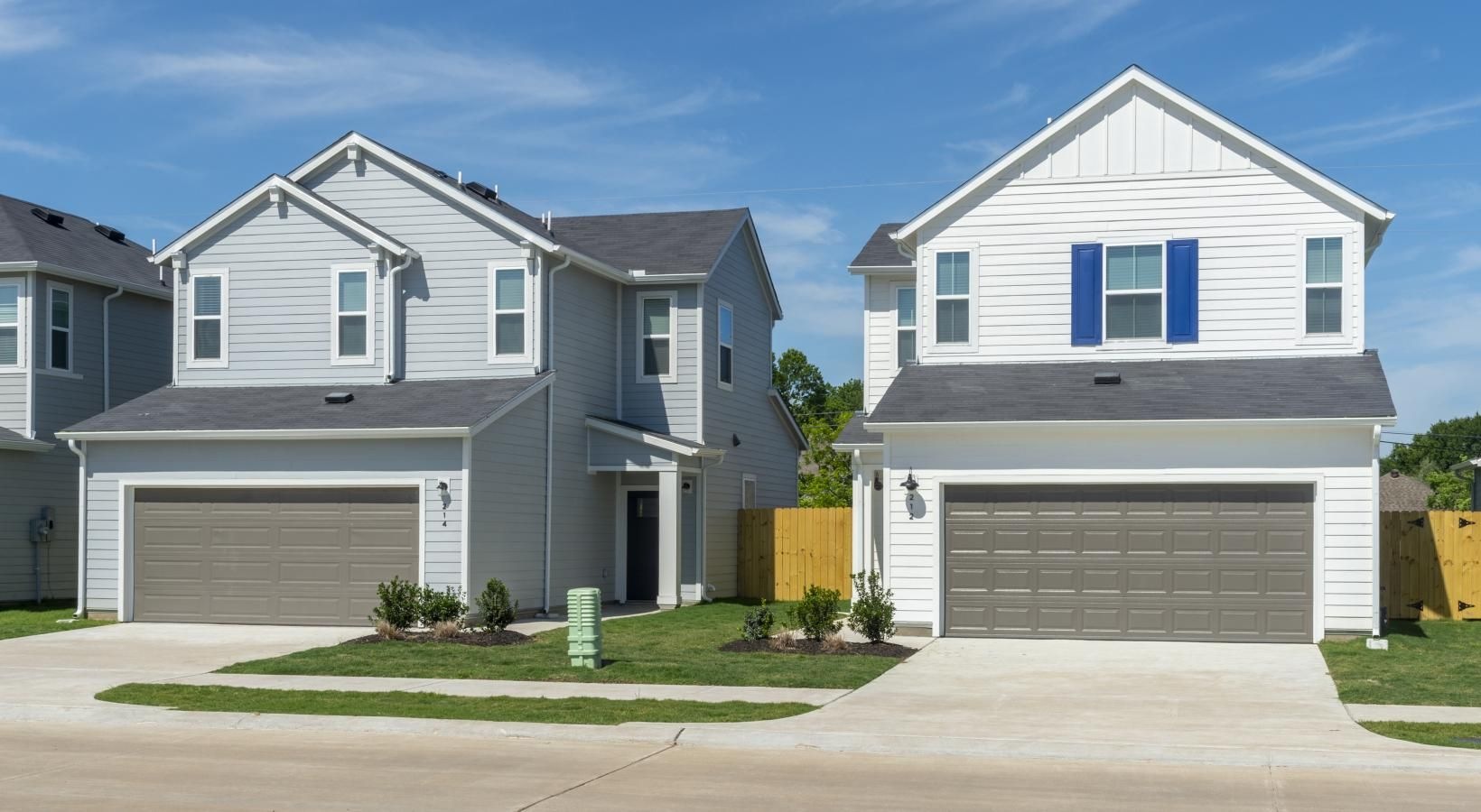 Settle into comfort at Inspire Missouri City a house with garages and a garage