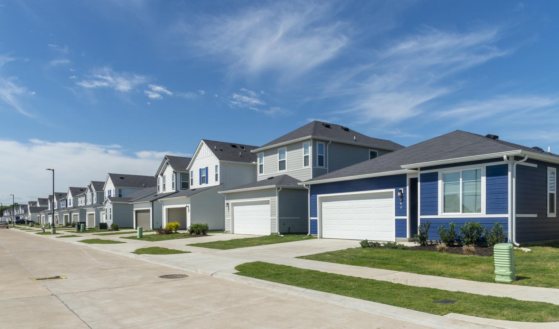 Settle into comfort at Inspire Missouri City a row of houses
